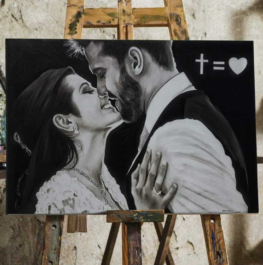 Casal pintado em óleo sobre tela